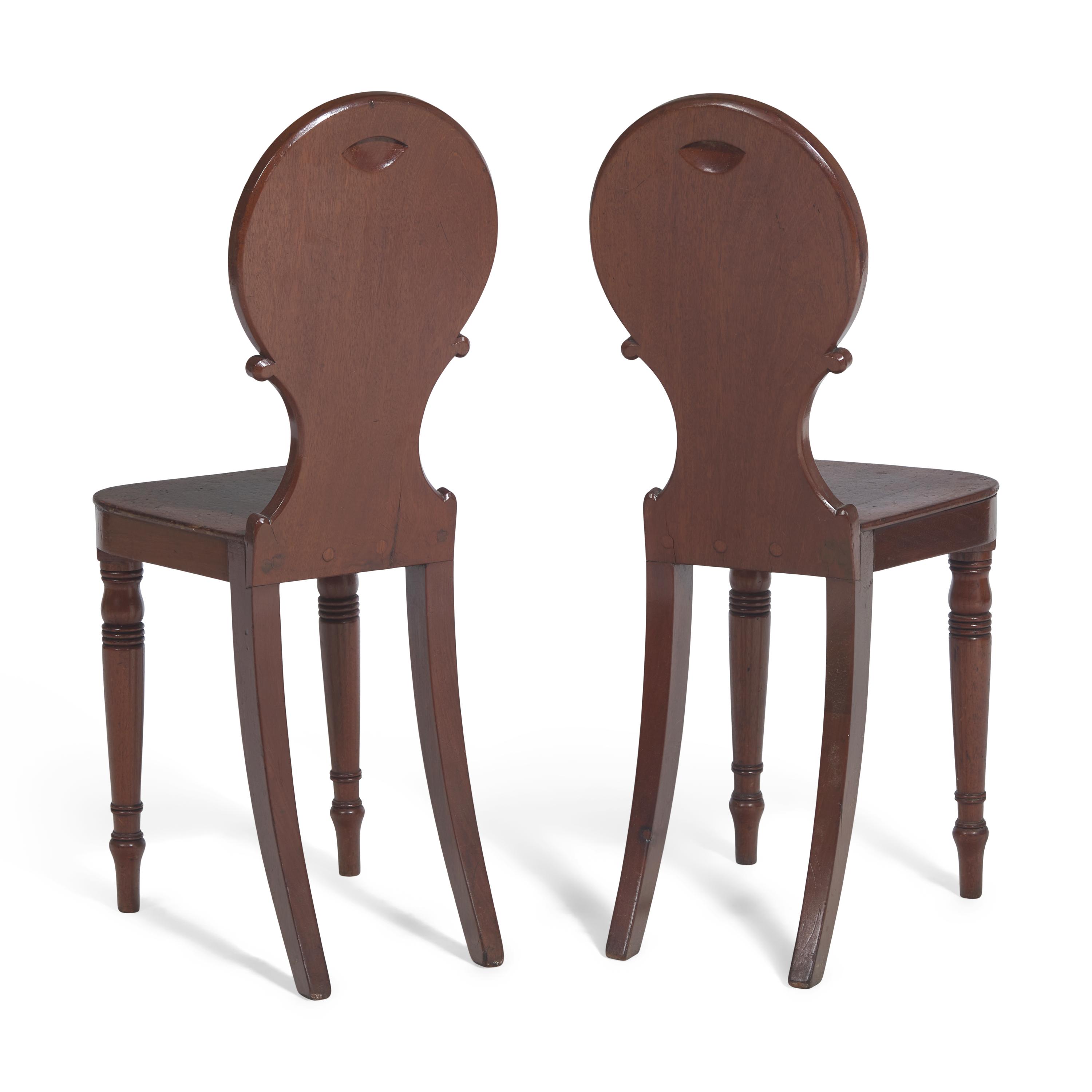 A Pair of Regency Mahogany Hall Chairs