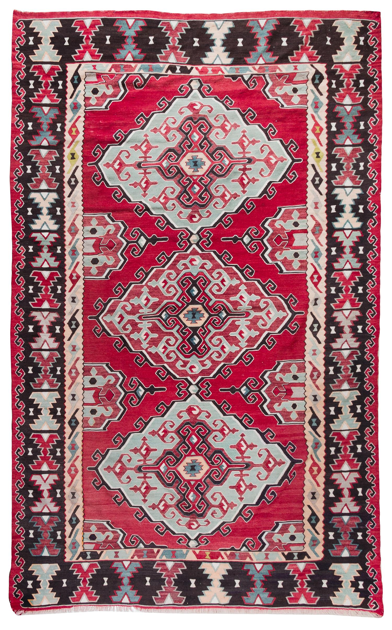 A Kilim Wool Rug 9 feet 3 inches x 6 feet 6 inches. — 20TH CENTURY