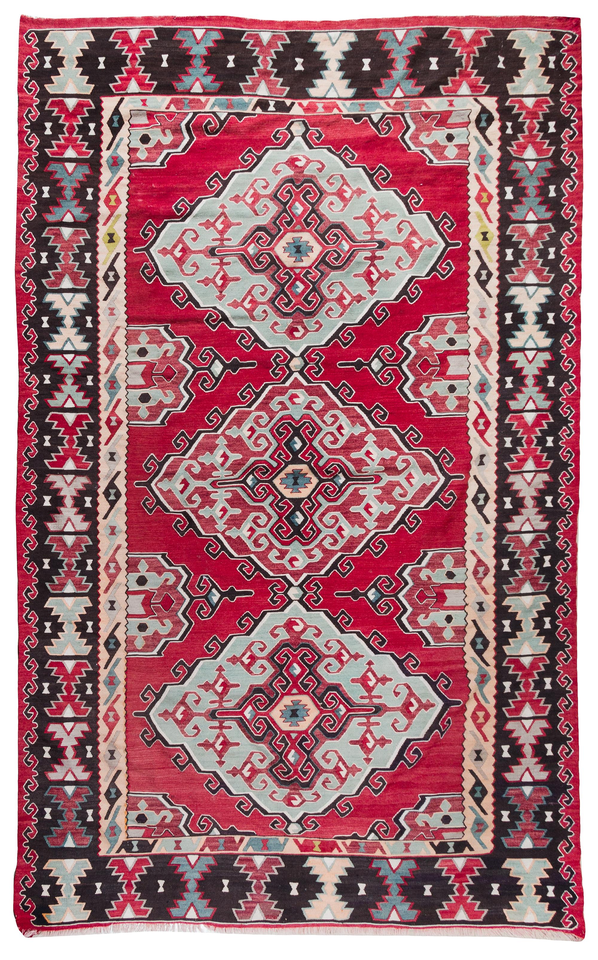 A Kilim Wool Rug 9 feet 3 inches x 6 feet 6 inches. — 20TH CENTURY