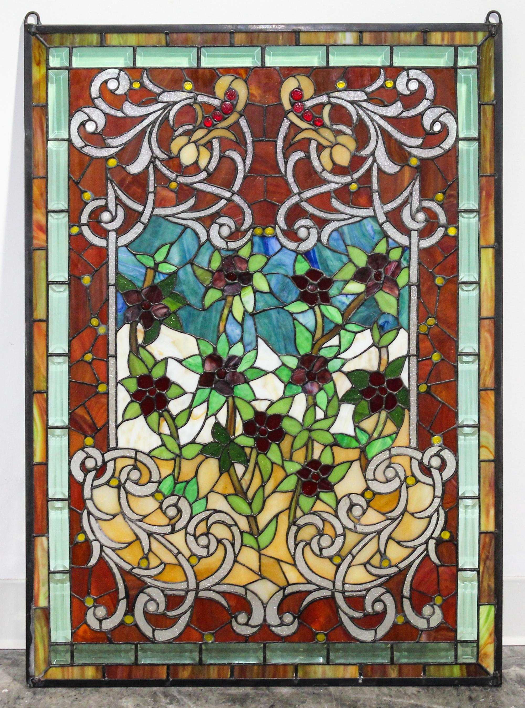 A Leaded Glass Floral Window. Height 36 3/4 x width 26 inches.