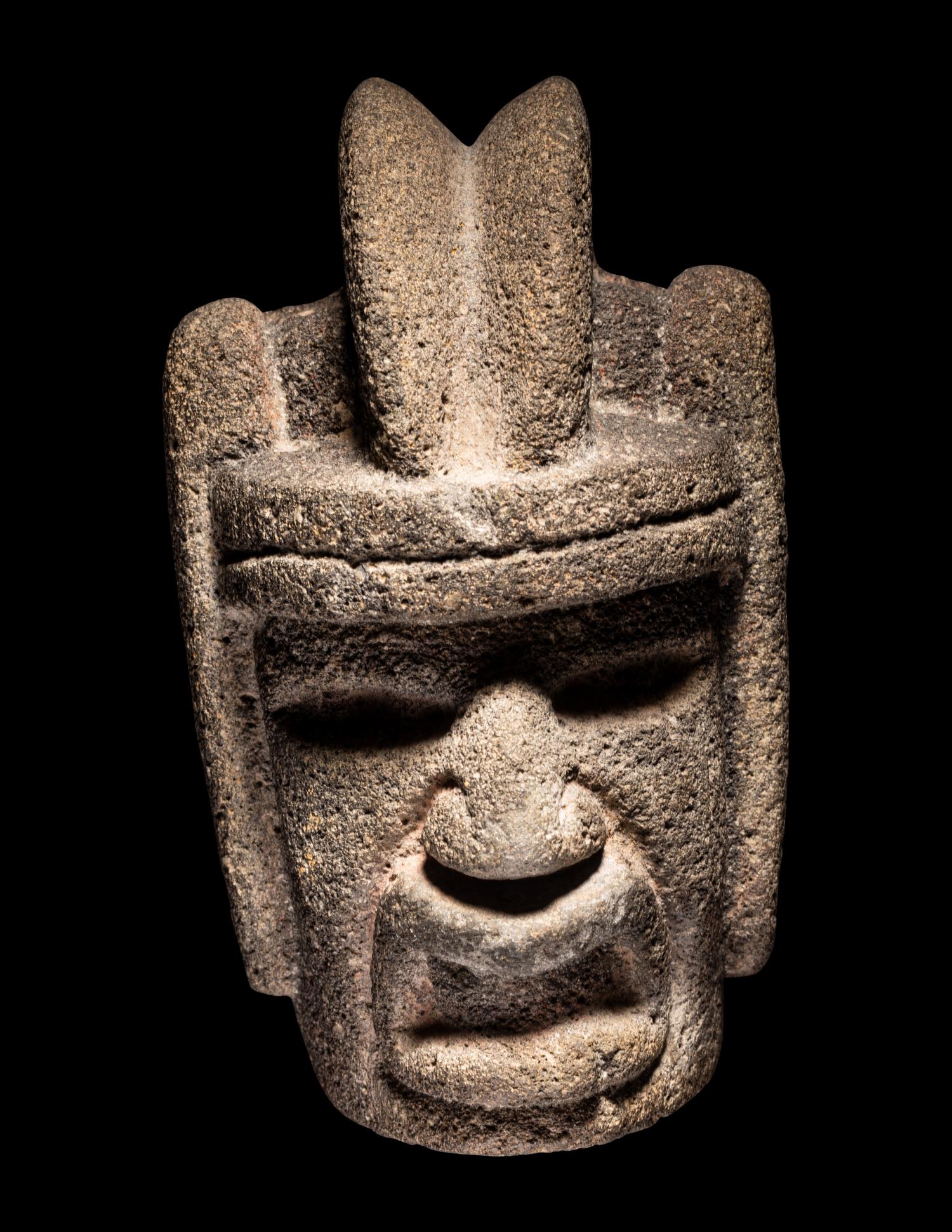 A Veracruz Stone Hacha in the Form of a Warrior