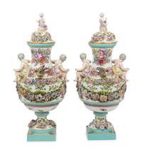 A Pair of Continental Porcelain Urns
