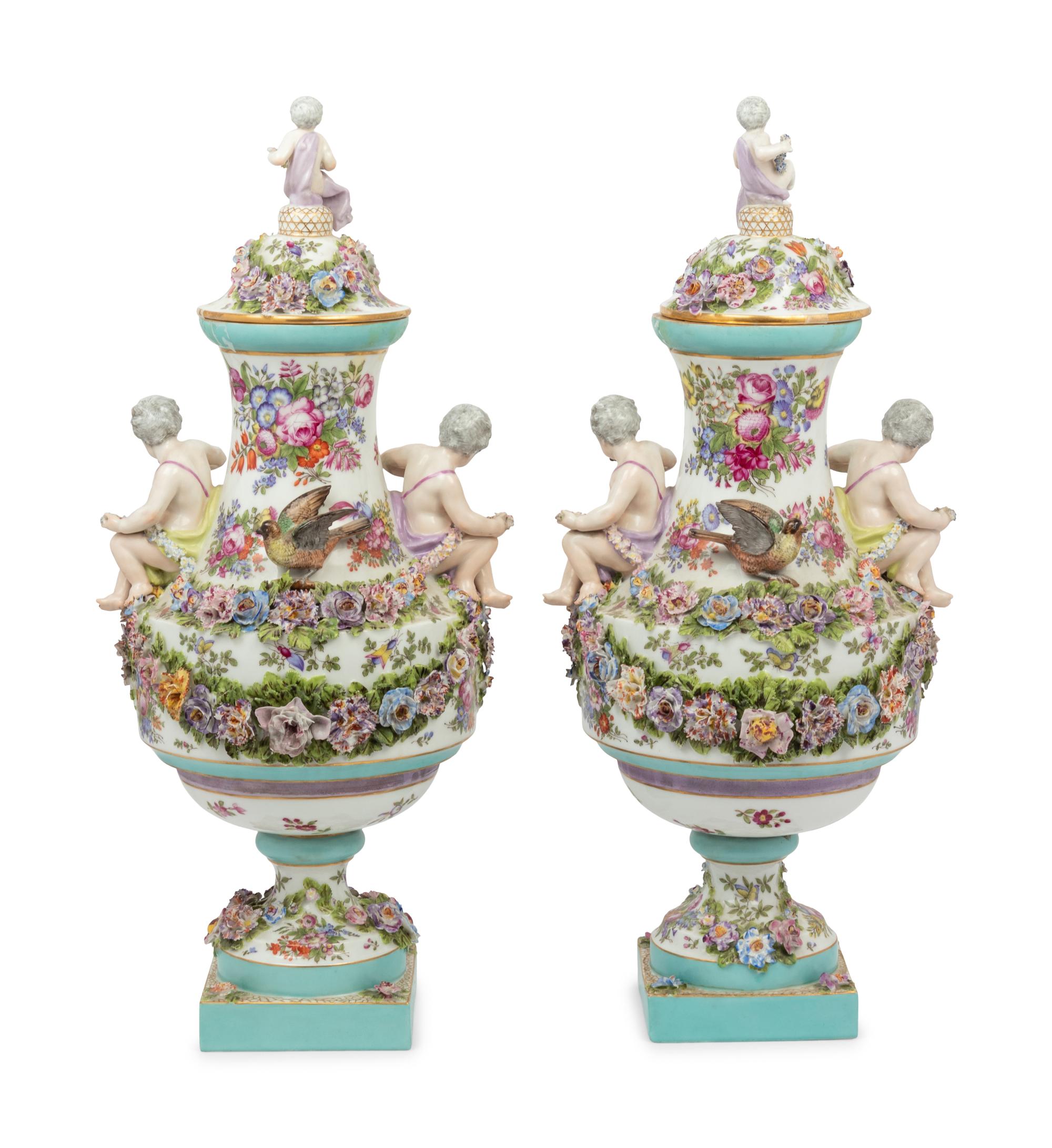 A Pair of Continental Porcelain Urns