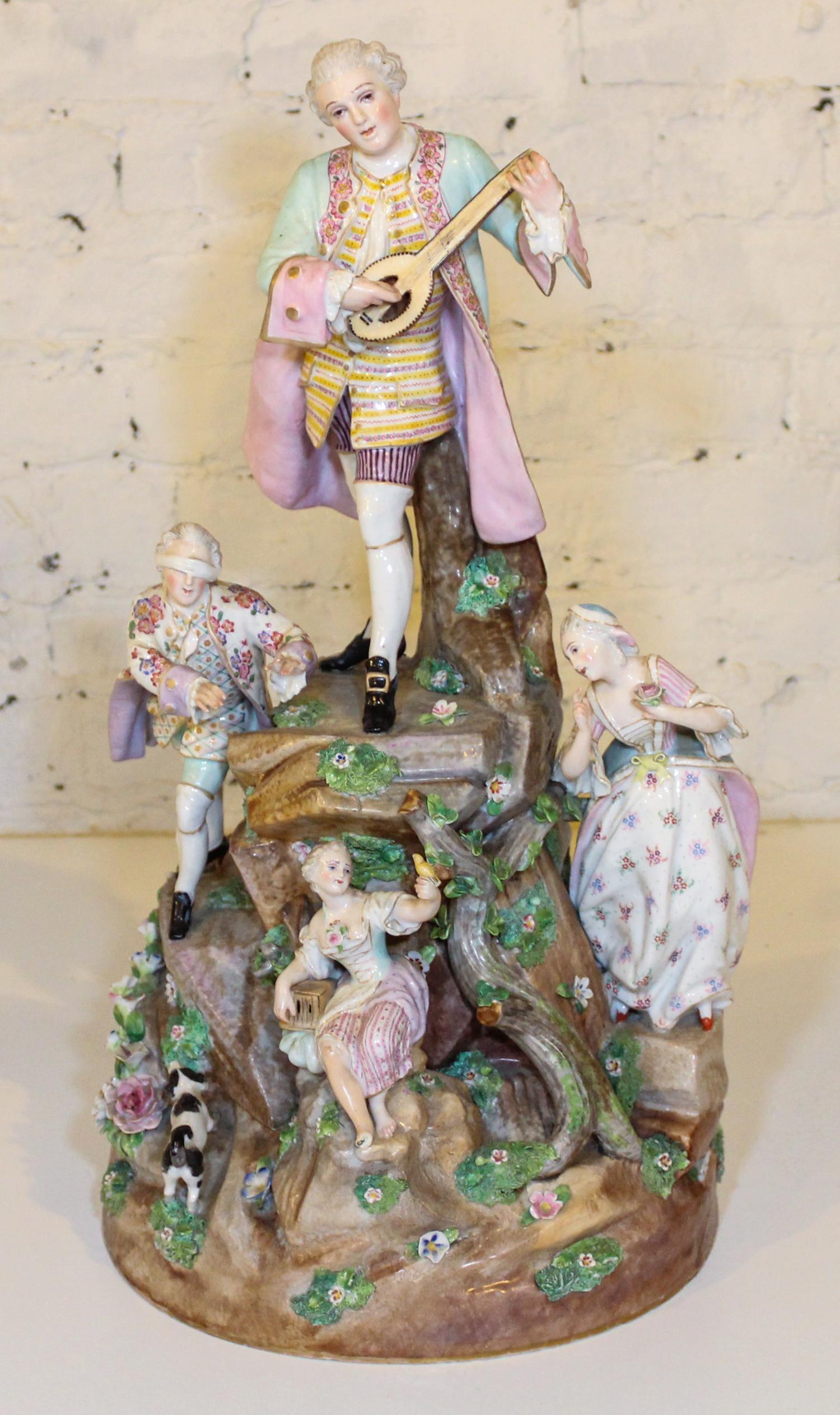A Continental Porcelain Figural Group. Height 21 1/2 inches.