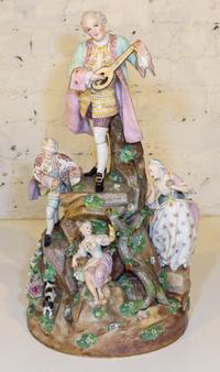 A Continental Porcelain Figural Group. Height 21 1/2 inches.
