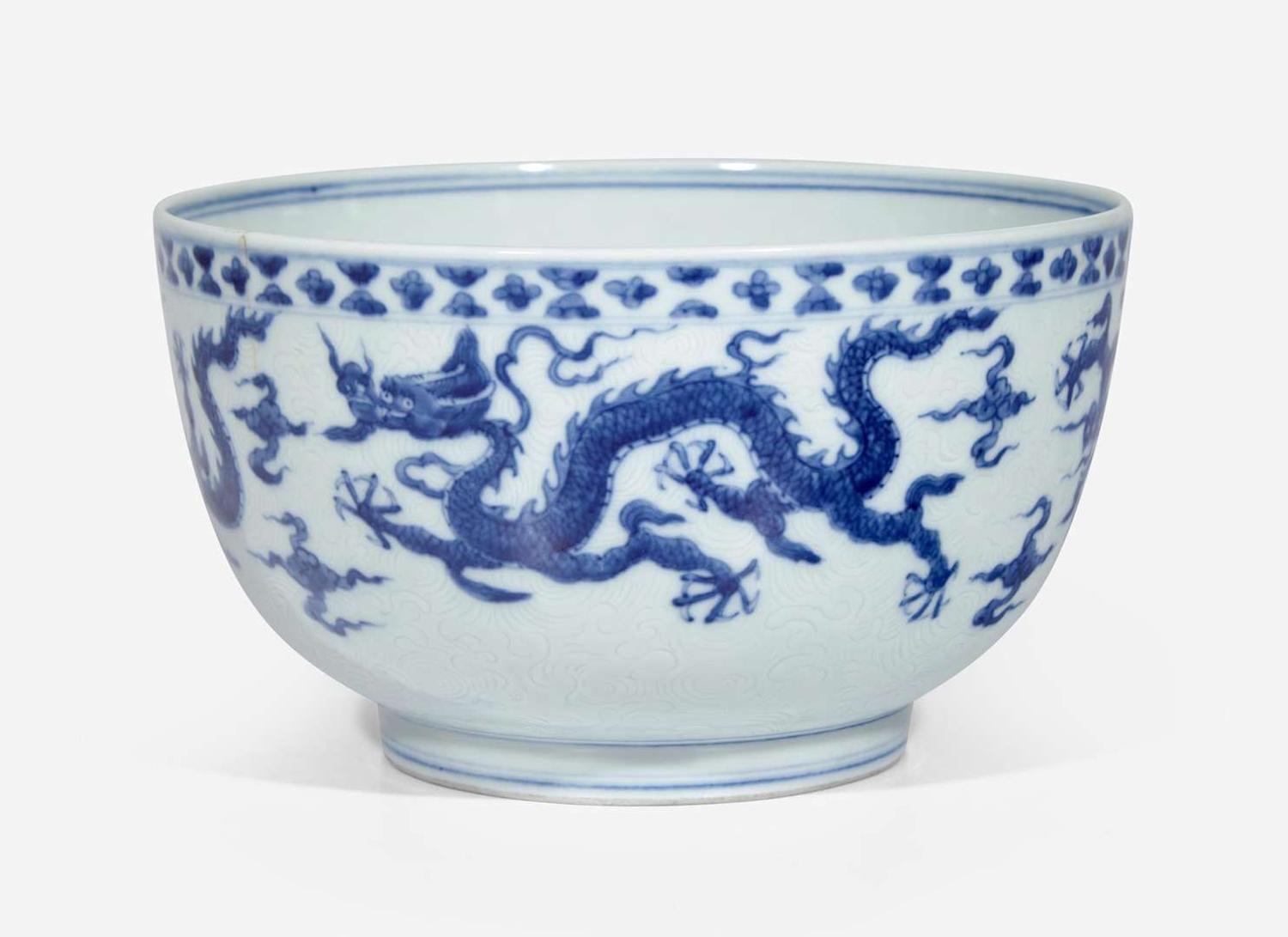 An unusual Chinese blue and white "Dragon" deep bowl, Zhengde mark, possibly 18th century 青花龍紋深腹盌 正德款 或十八世紀
