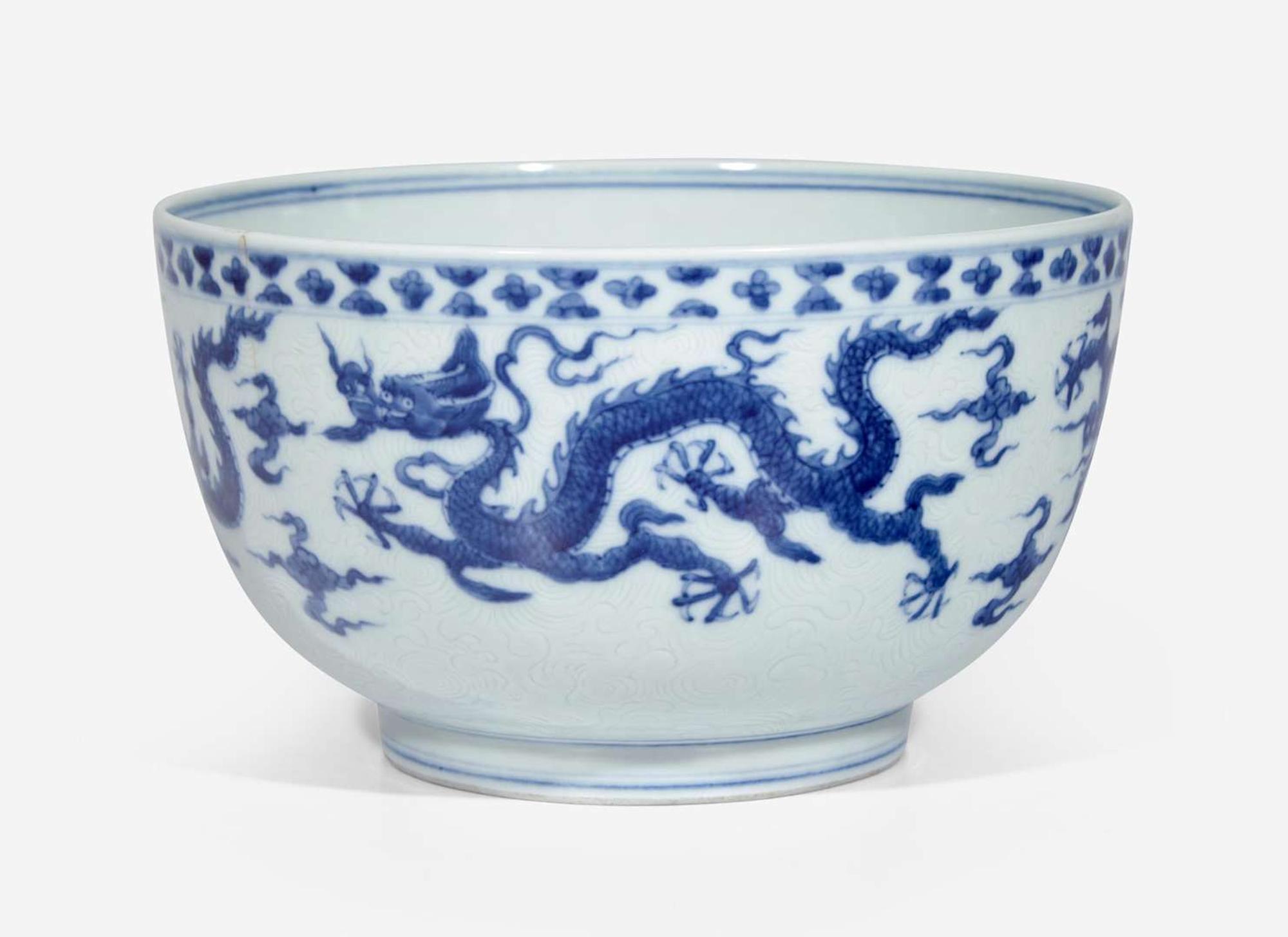 An unusual Chinese blue and white "Dragon" deep bowl, Zhengde mark, possibly 18th century 青花龍紋深腹盌 正德款 或十八世紀
