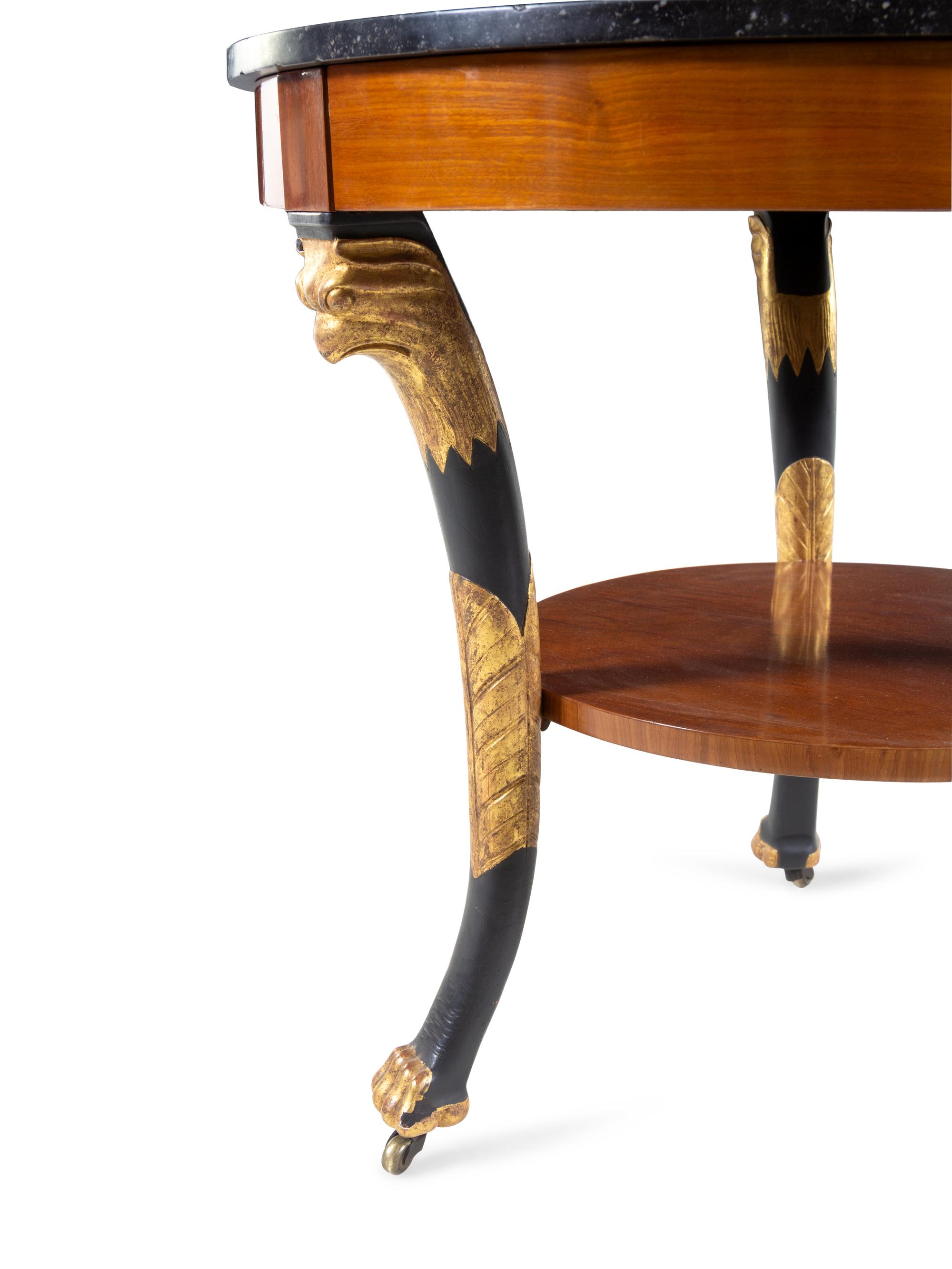 An Empire Parcel Gilt and Black-Lacquered Marble Top Guéridon