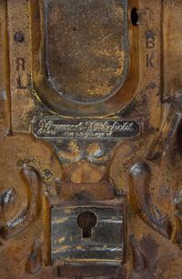 An Oriental Theater Auditorium Figural Seat End Height 25 1/2 inches. — CIRCA 1920'S