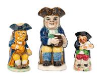 A Dr. Johnson Toby Jug and Two Other Toby Jugs