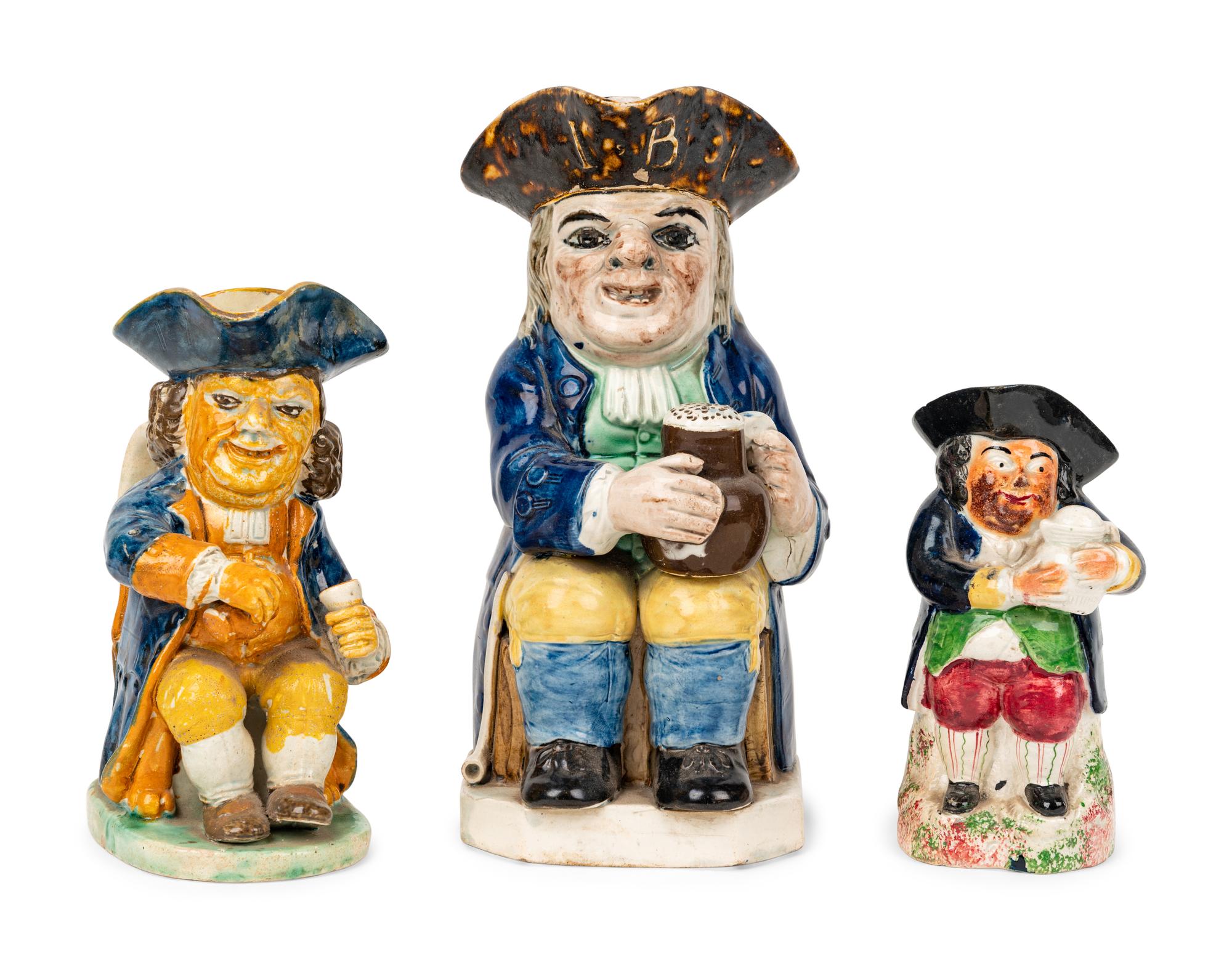 A Dr. Johnson Toby Jug and Two Other Toby Jugs