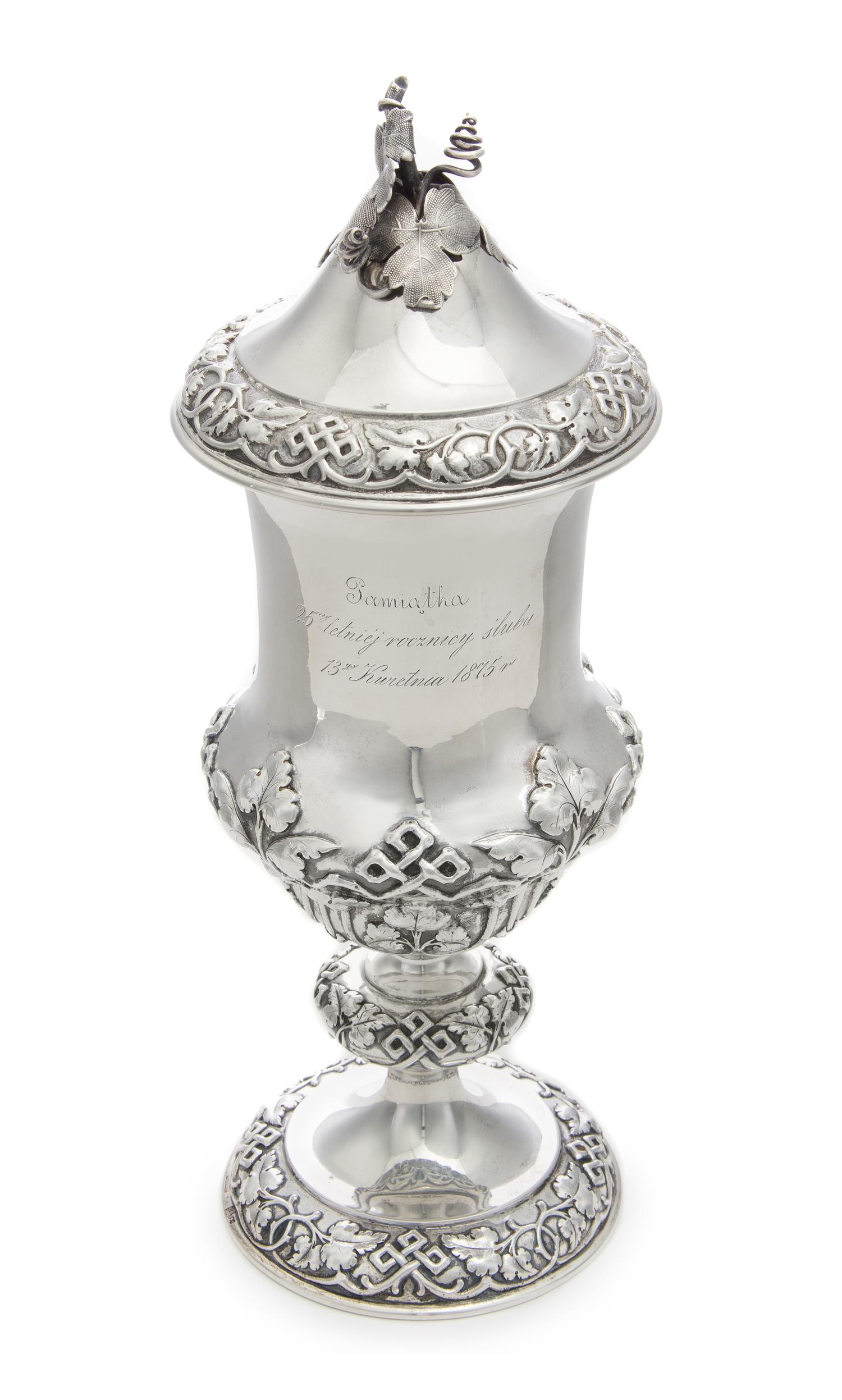 A Russian Silver Cup and Cover, Teodor Werner & Son, Assay Mark Cyrillic S.P., Warsaw, 1874, the foliate finial above the lid with foli