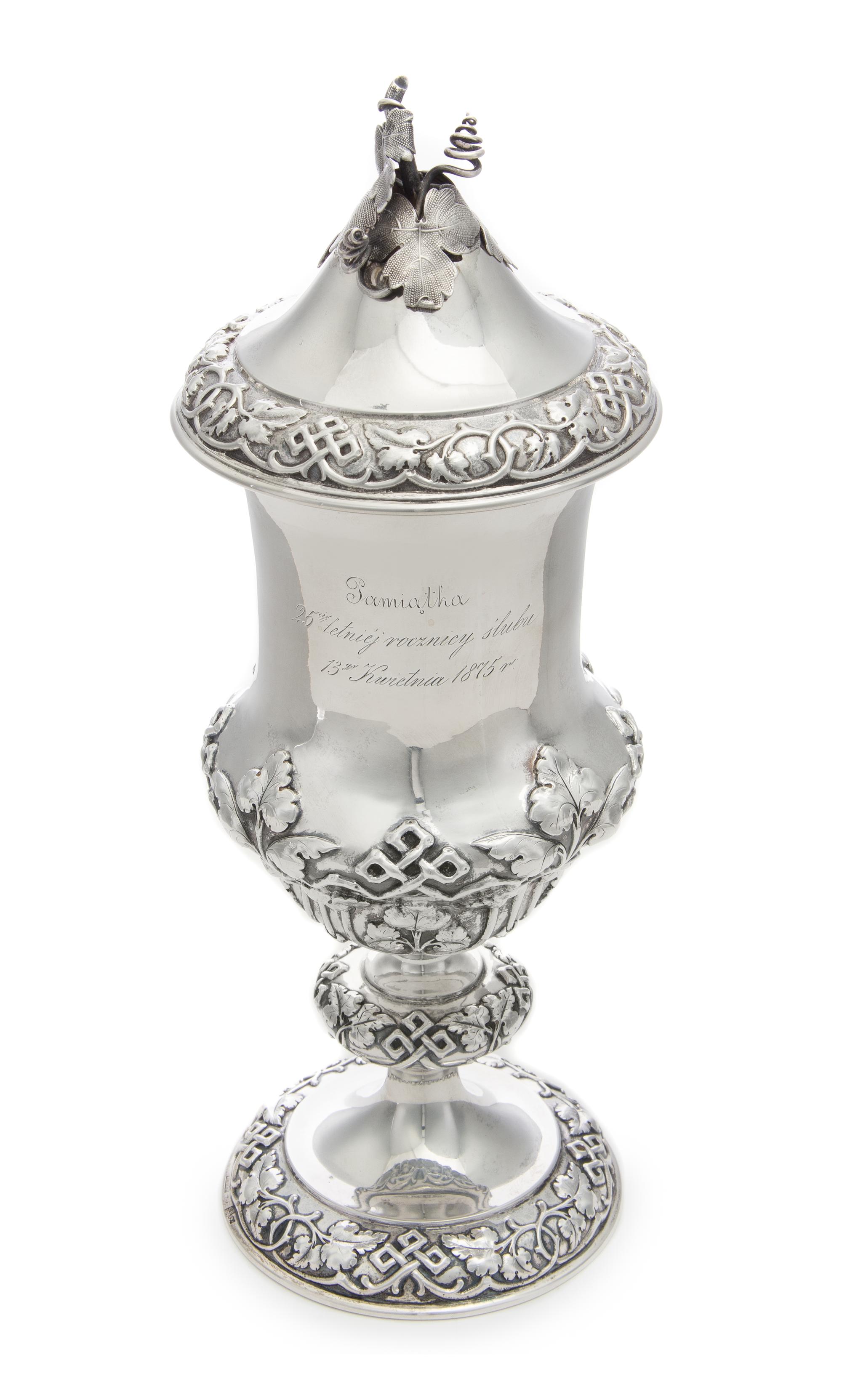 A Russian Silver Cup and Cover, Teodor Werner & Son, Assay Mark Cyrillic S.P., Warsaw, 1874, the foliate finial above the lid with foli