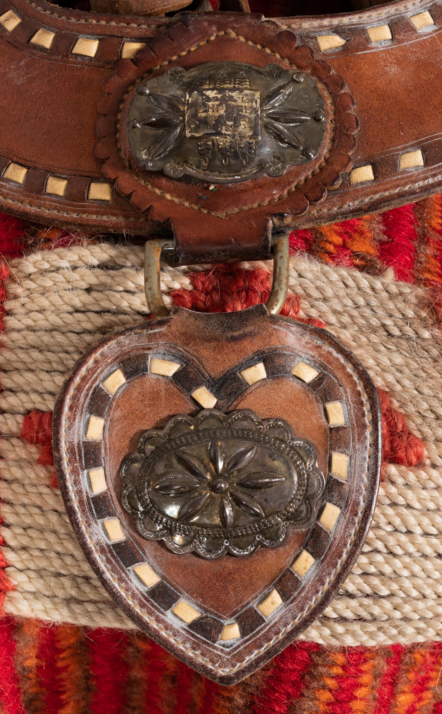 A Tooled Leather and Silver Adorned Parade Saddle