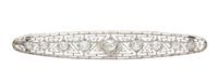 An Art Deco Platinum and Diamond Bar Brooch, 7.70 dwts.