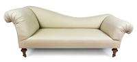 A Victorian Style Mahogany and Linen Upholstered Fainting Couch Length 80 inches.