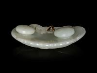 Five Chinese Celadon and Russet Jade Plaques