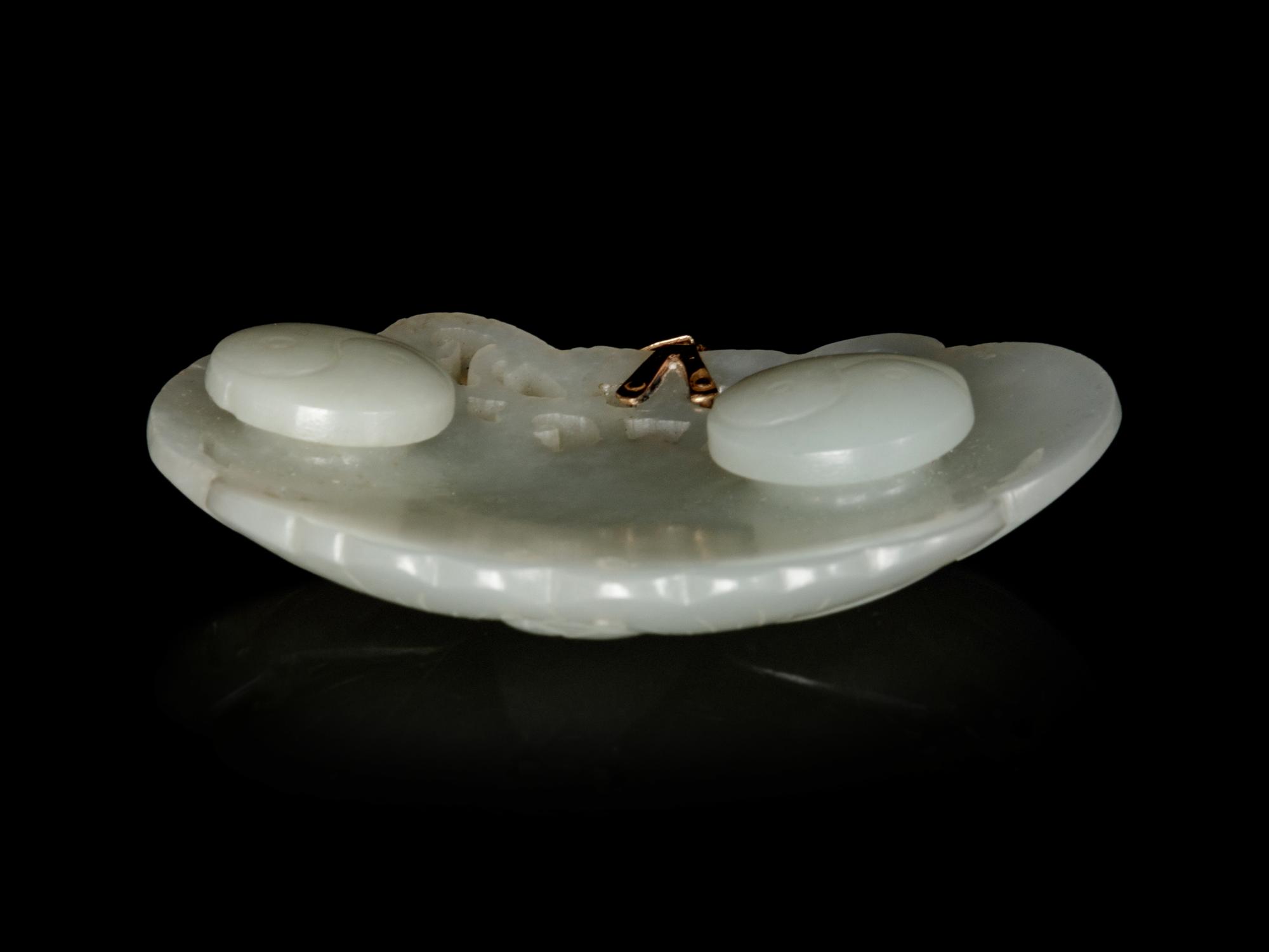 Five Chinese Celadon and Russet Jade Plaques