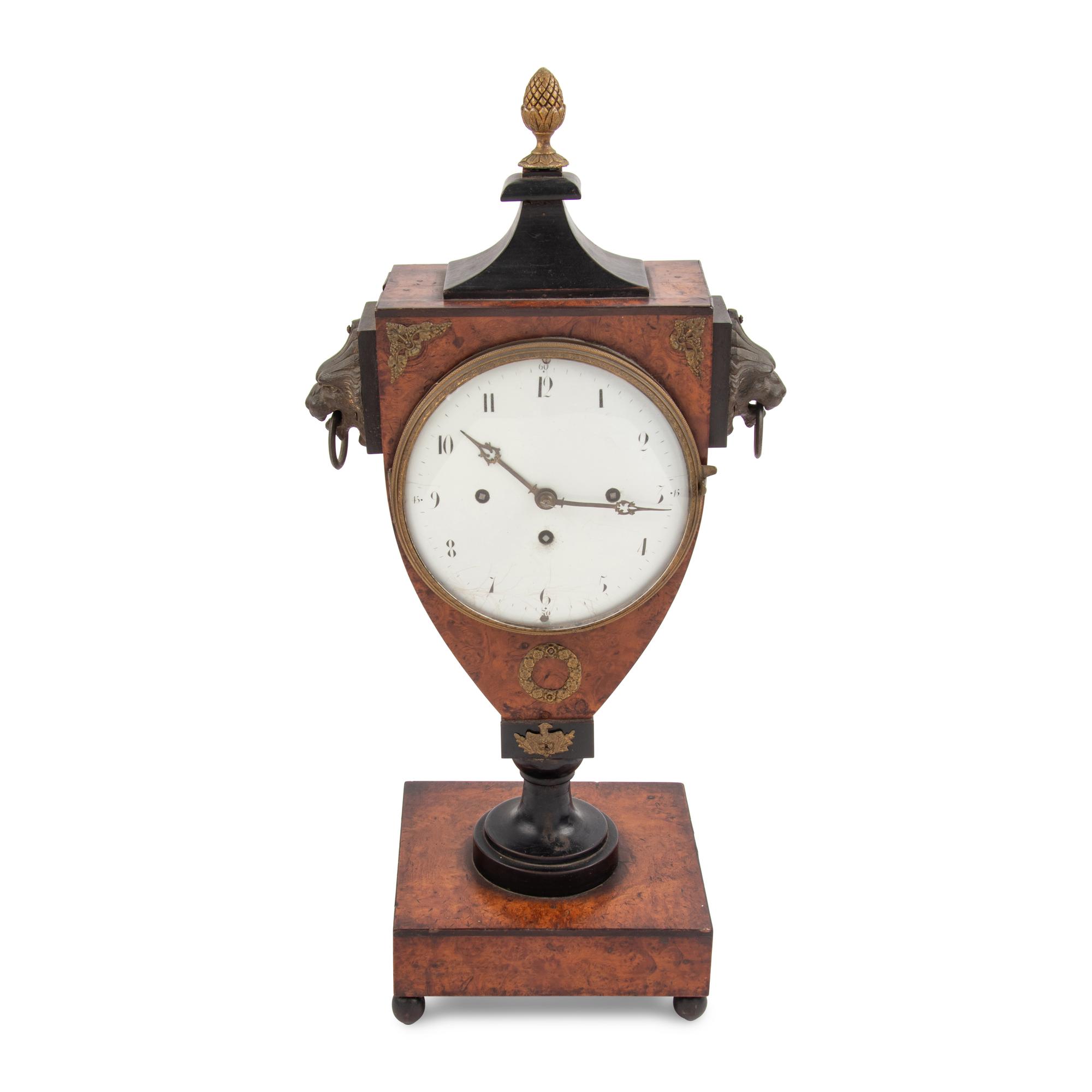 An Empire Style Burl Walnut and Part-Ebonized Mantel Clock
