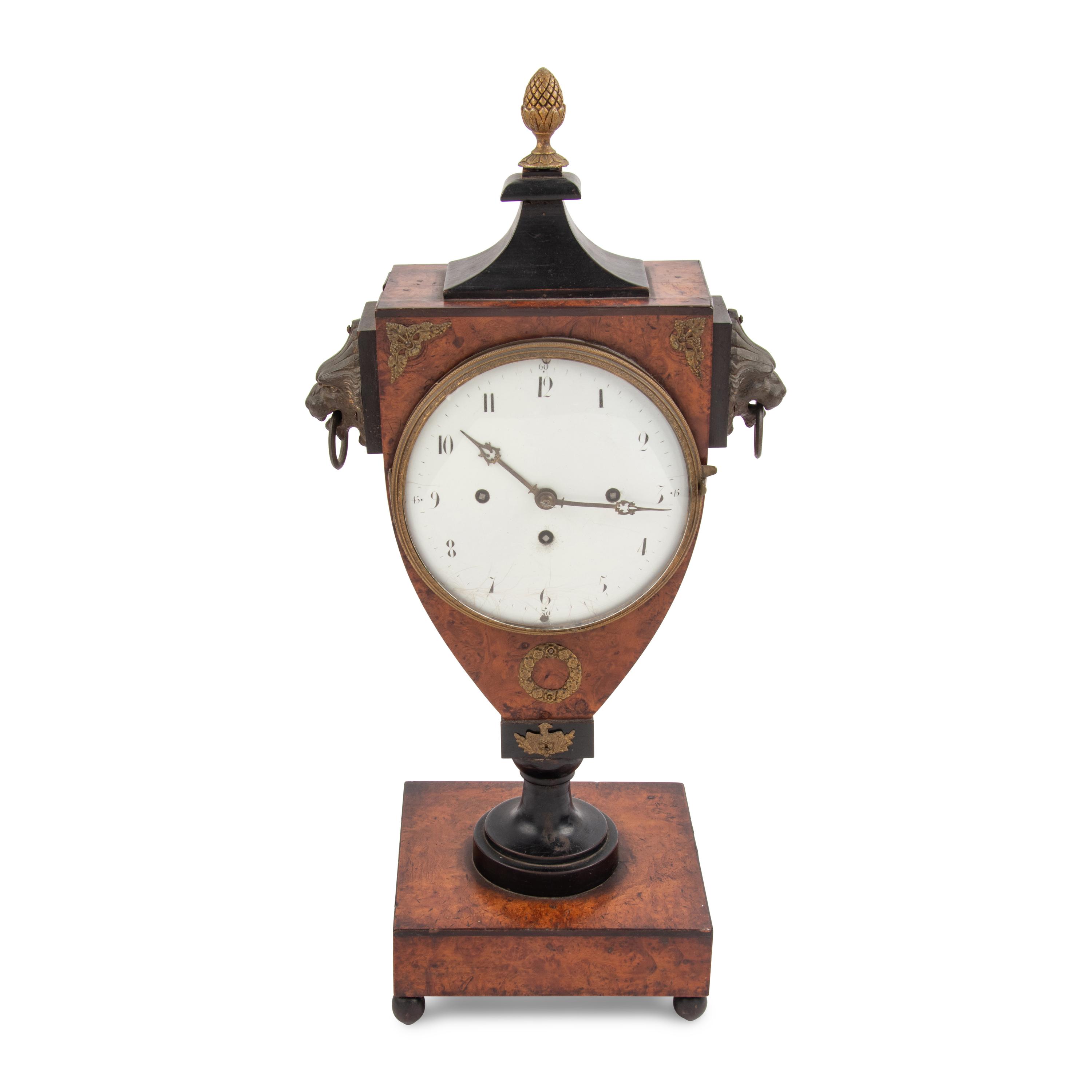 An Empire Style Burl Walnut and Part-Ebonized Mantel Clock