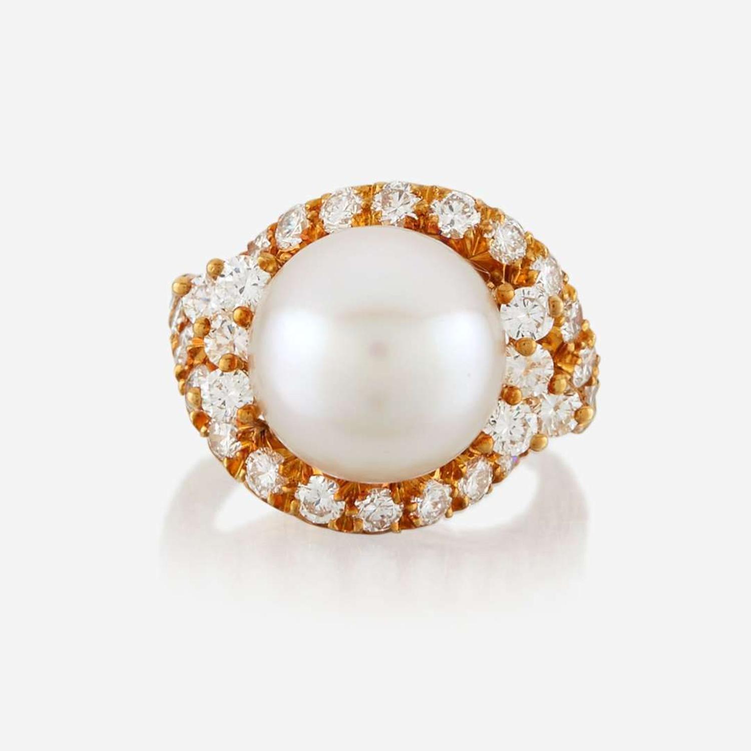 A cultured pearl, diamond, and gold ring