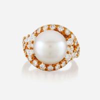 A cultured pearl, diamond, and gold ring
