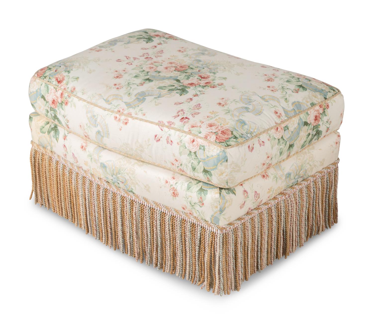 A Floral Chintz-Upholstered Lounge Chair and Ottoman