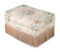 A Floral Chintz-Upholstered Lounge Chair and Ottoman