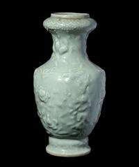 A Chinese Molded Celadon Glazed Porcelain Vase
