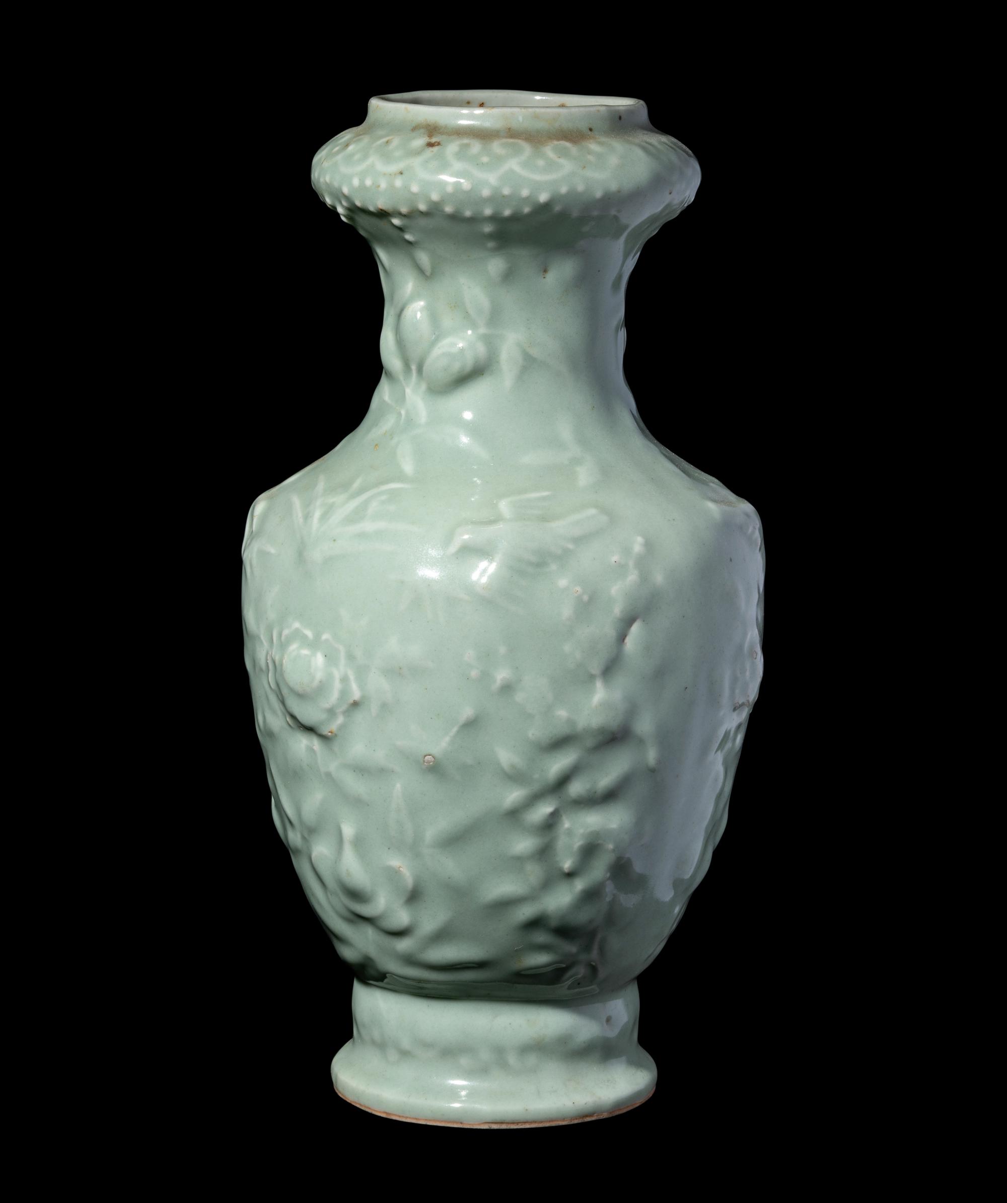 A Chinese Molded Celadon Glazed Porcelain Vase