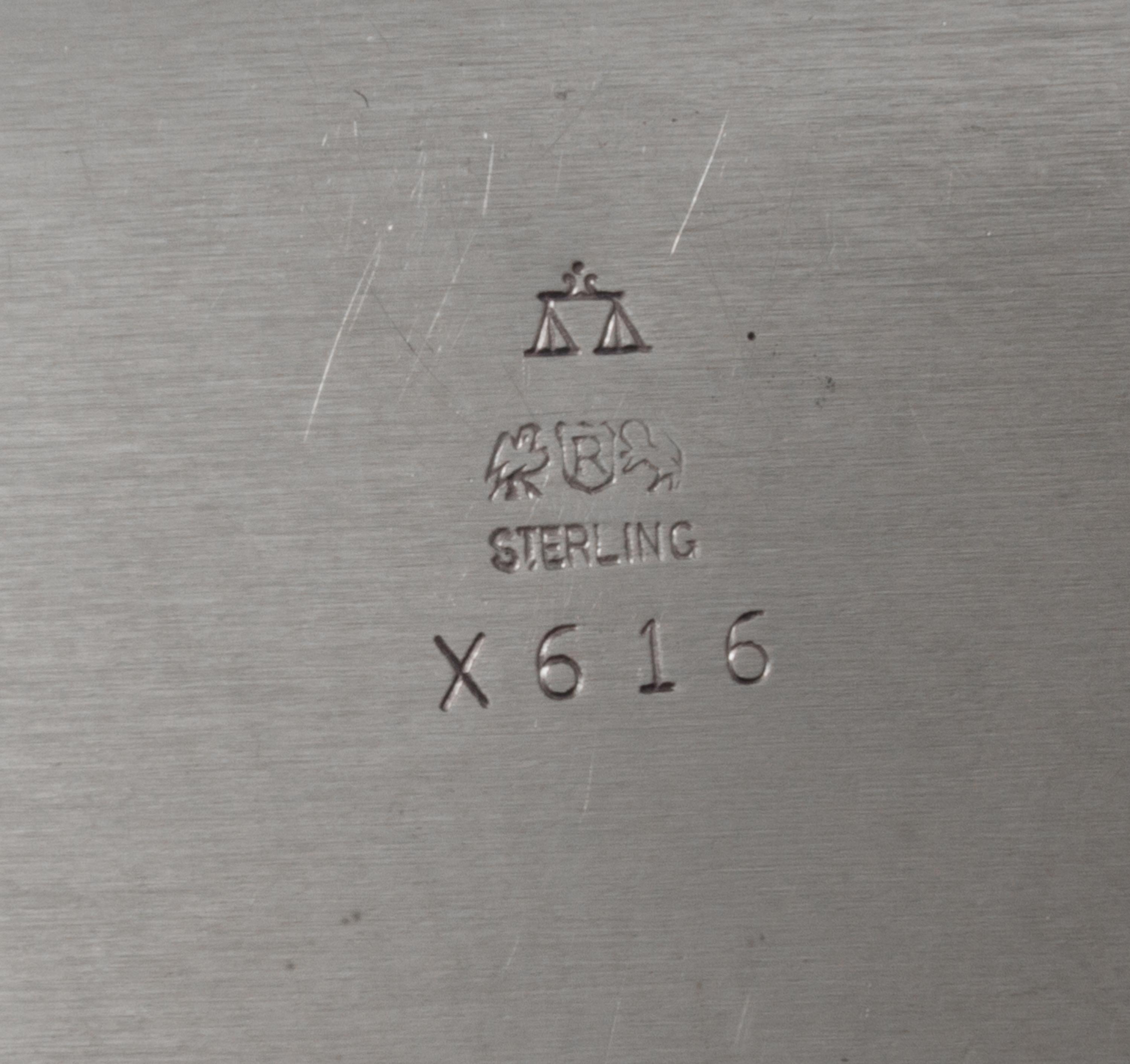 An American Silver Covered Entree Dish, Reed & Barton, Taunton, MA, 1947, of rectangular form with lift off handled lid.