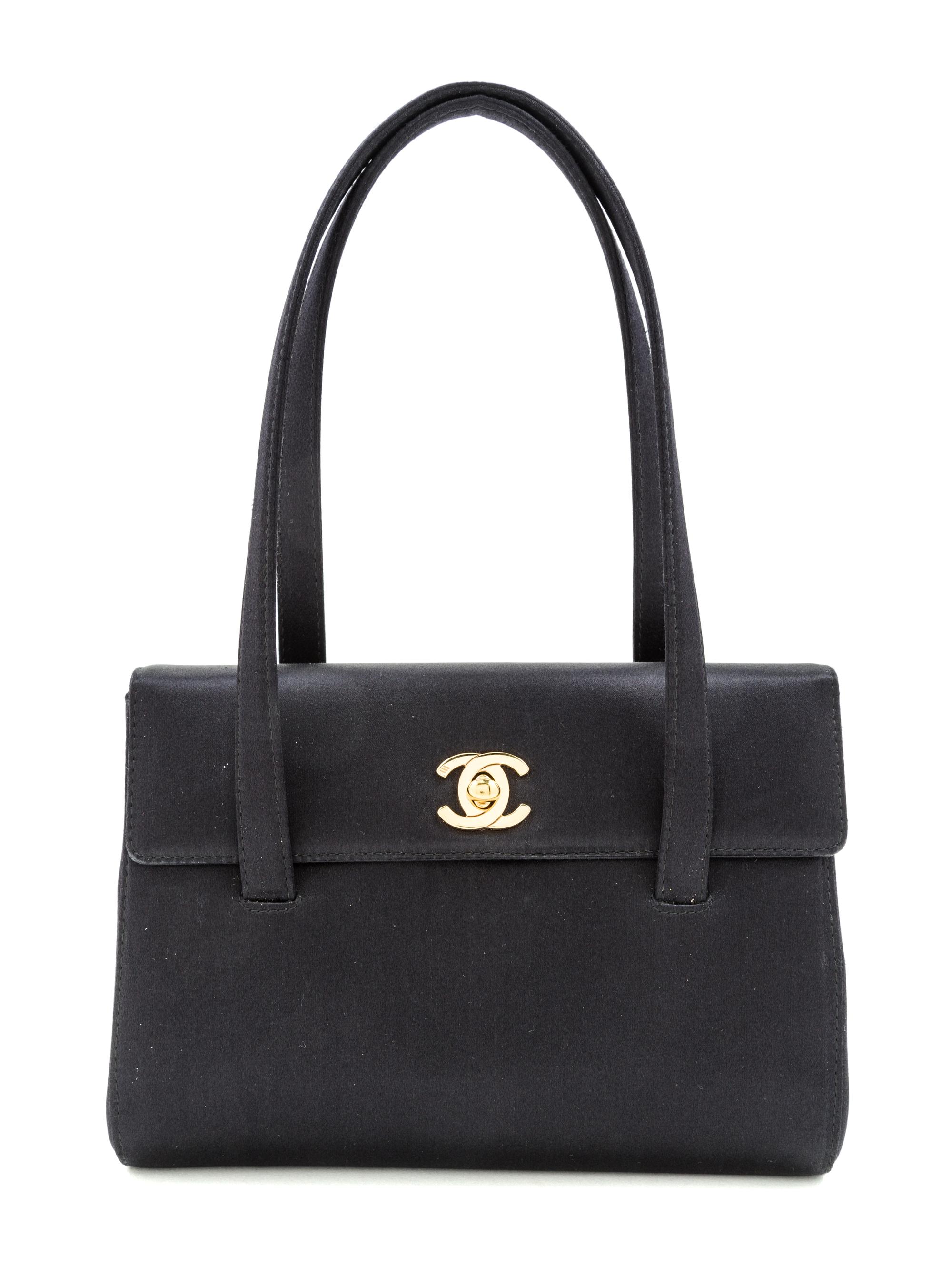 A Chanel Black Satin Small Flap Handbag, 7.5" x 5.5" x 1.75"; Handle drop: 5.5".