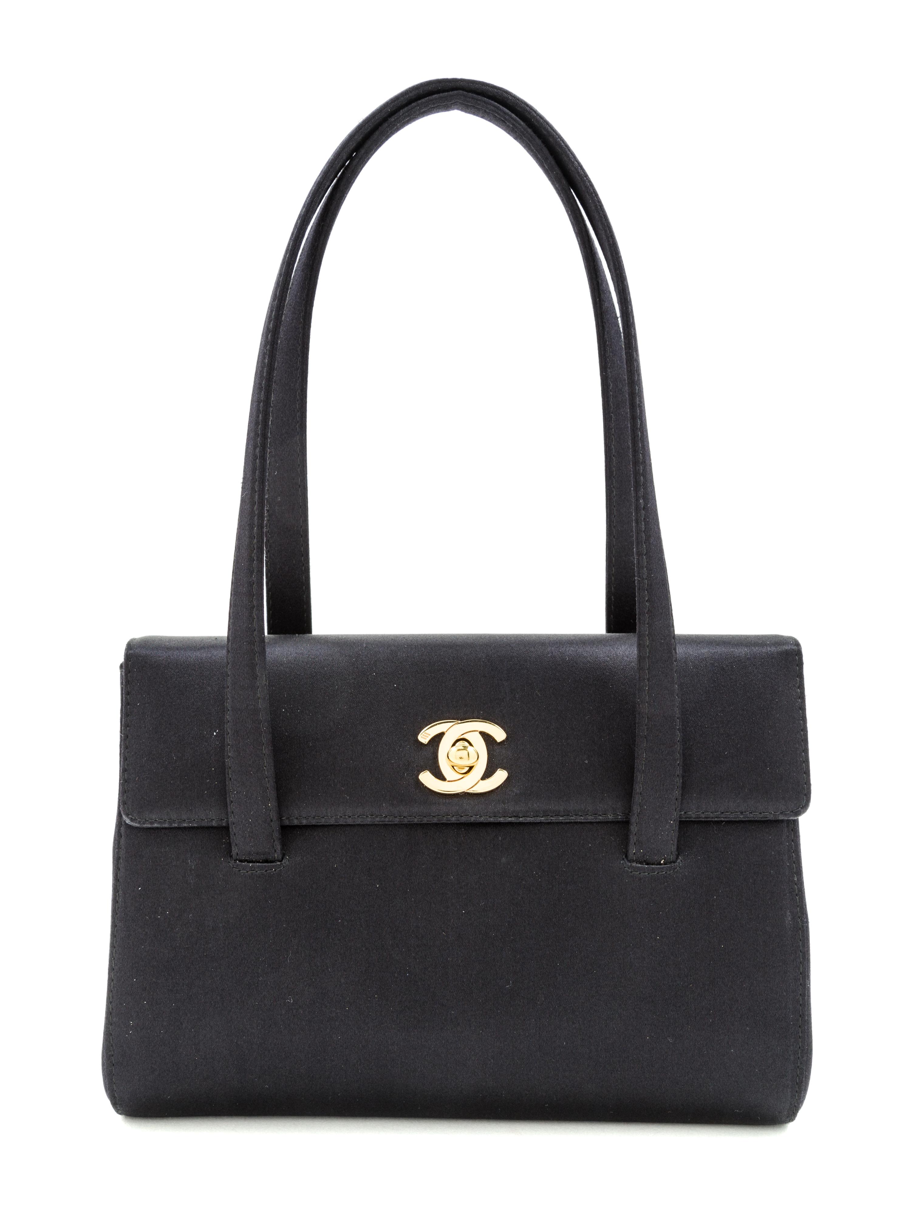 A Chanel Black Satin Small Flap Handbag, 7.5" x 5.5" x 1.75"; Handle drop: 5.5".