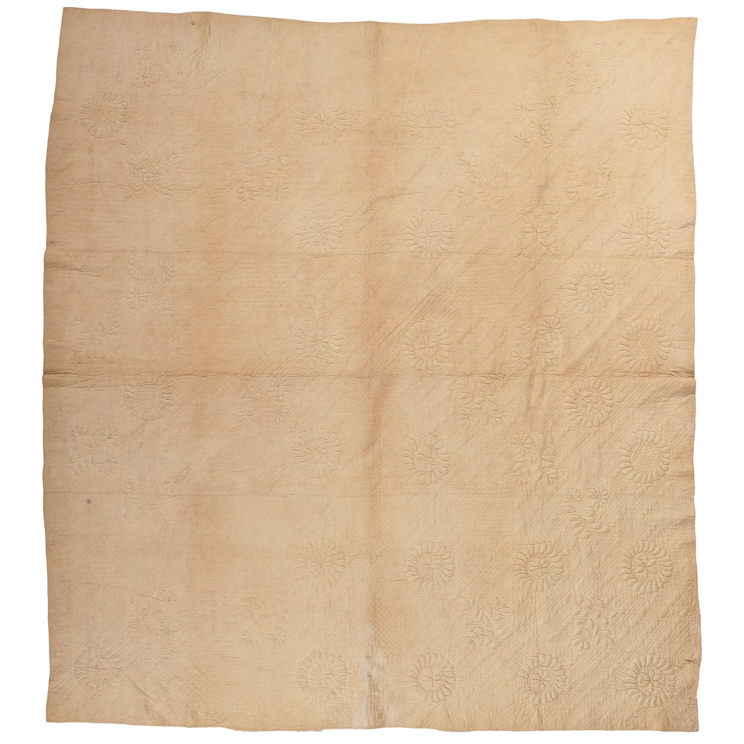 A Monkey Wrench Trapunto Quilt
