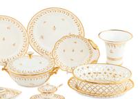 A Parcel-Gilt Porcelain Dinner Service