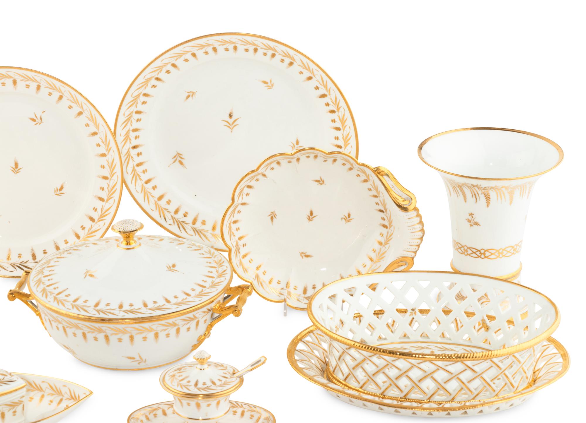 A Parcel-Gilt Porcelain Dinner Service