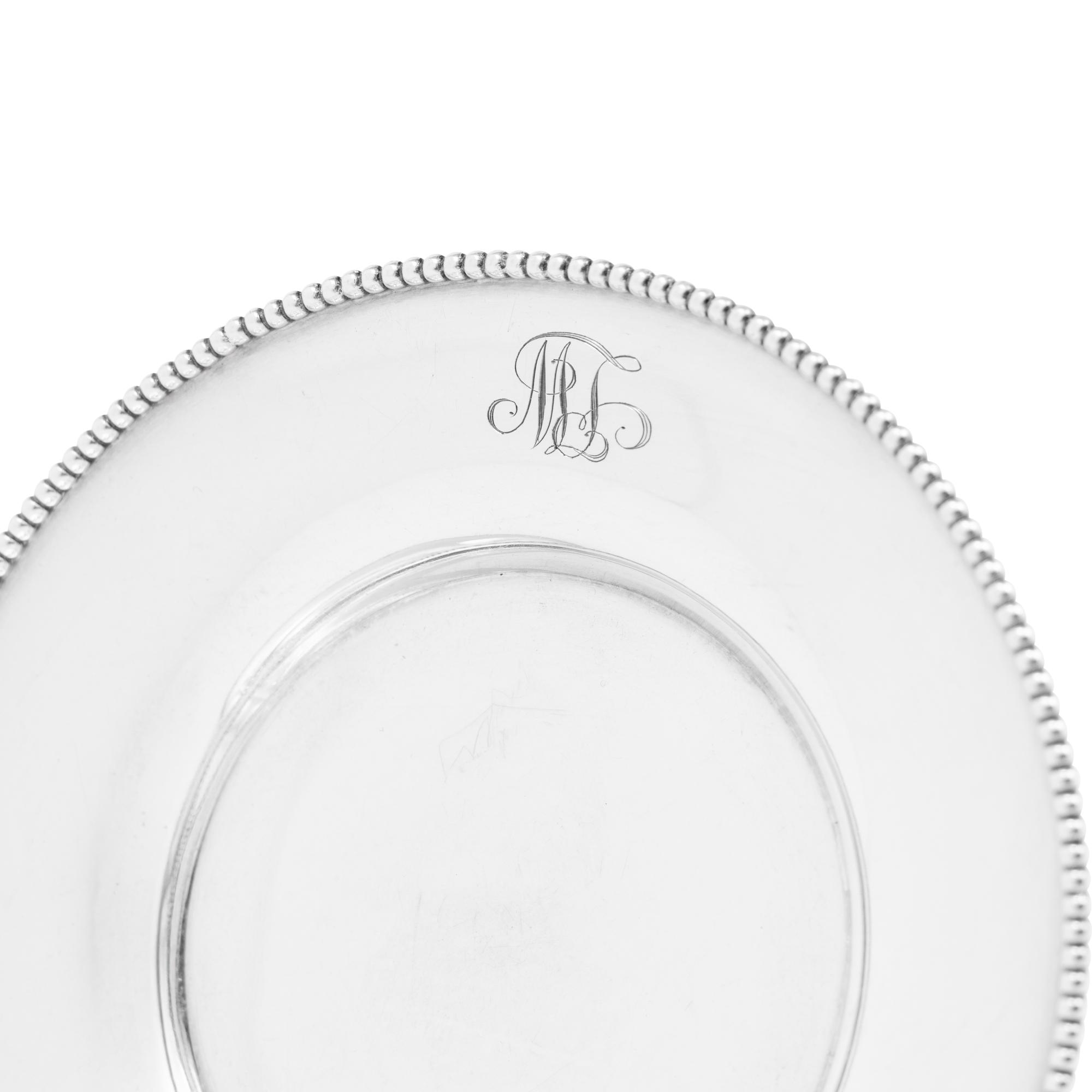 A Set of Twelve American Silver Bread Plates