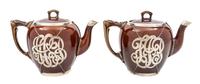 A Pair of Ceramic Silver Overlay Teapots Height of taller 6 inches.