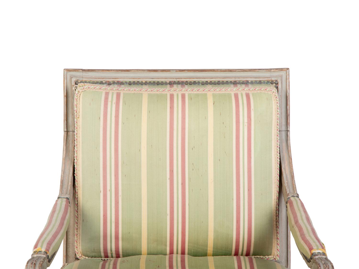 A Louis XVI Style Painted Fauteuil — 18TH/19TH CENTURY