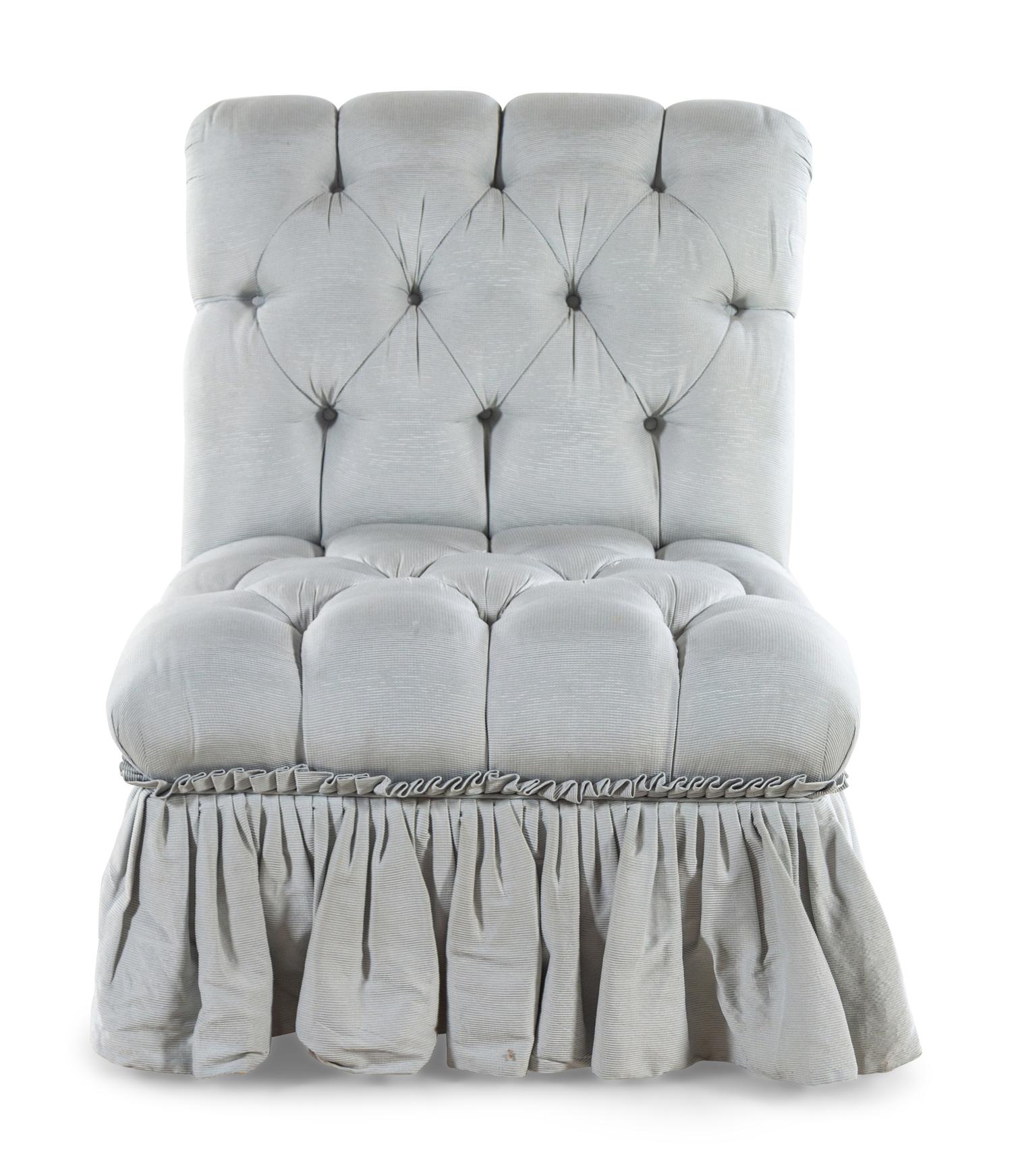 A Button Tufted Slipper Chair