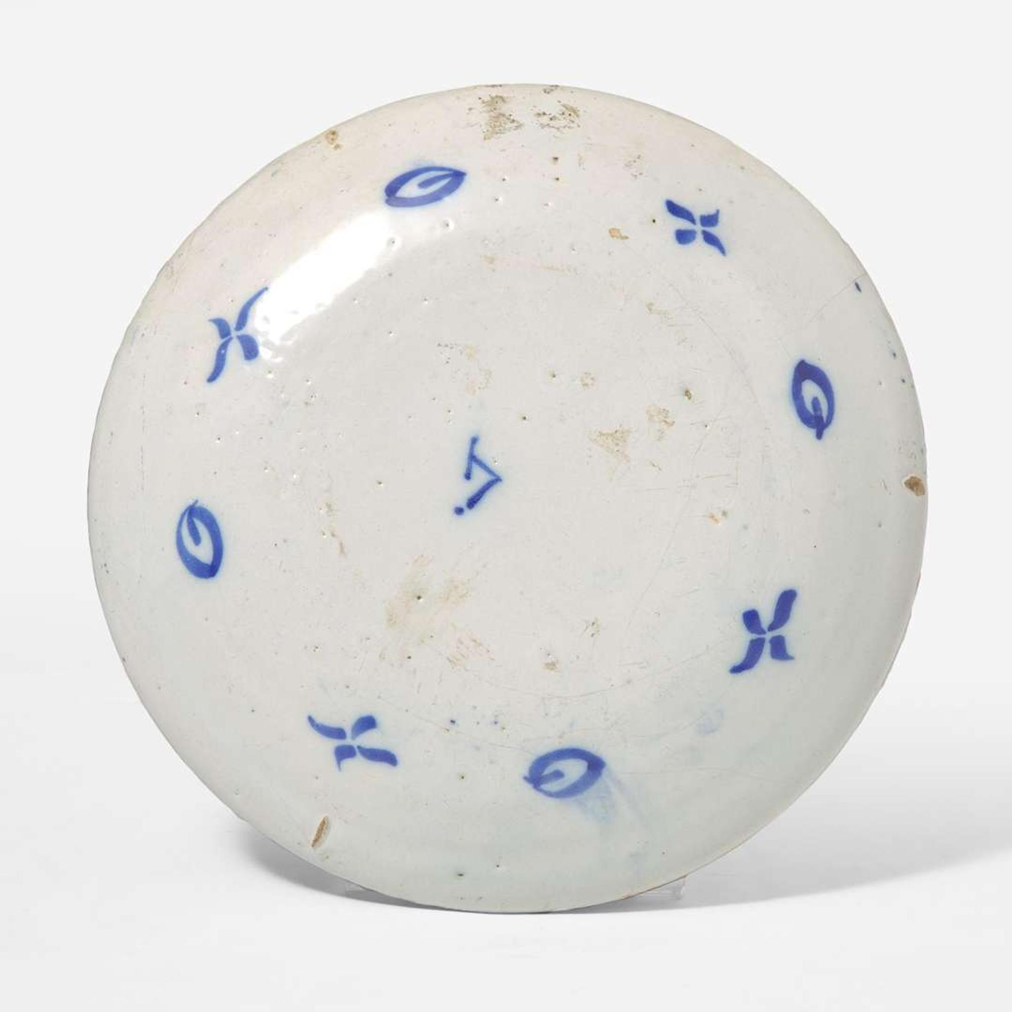 A Dutch Delft marriage plate Dated "1731"