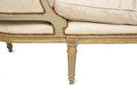 A French Provincial Style Painted and Parcel Gilt Chaise Longue