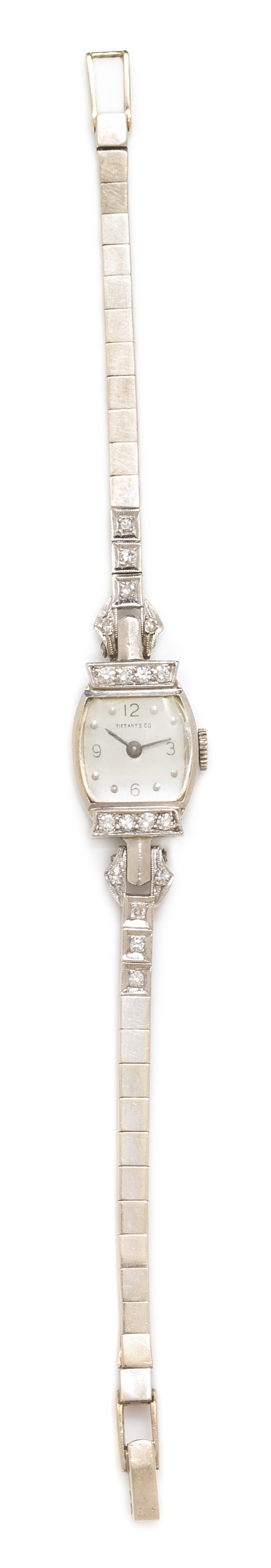 A Palladium, 14 Karat White Gold and Diamond Wristwatch, Tiffany & Co., 10.34 dwts.