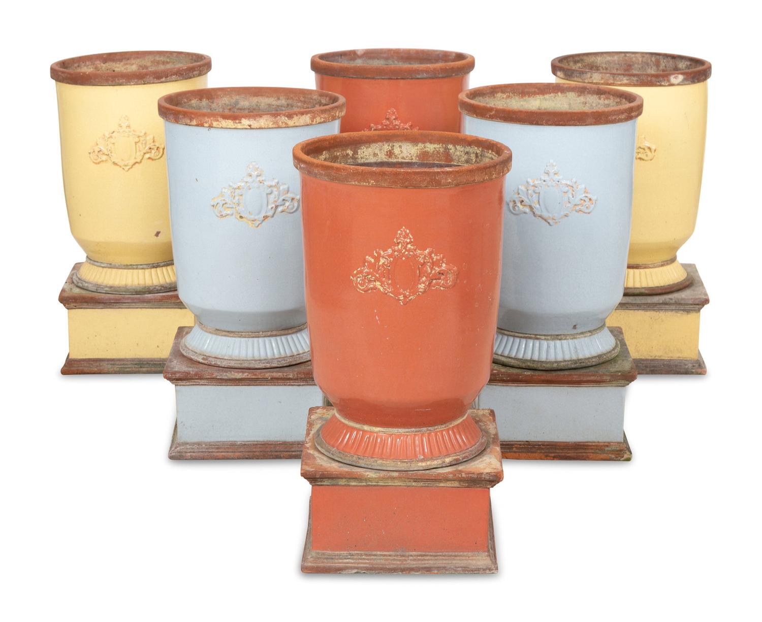 Three Pairs of Glazed Ceramic Planters on Stands