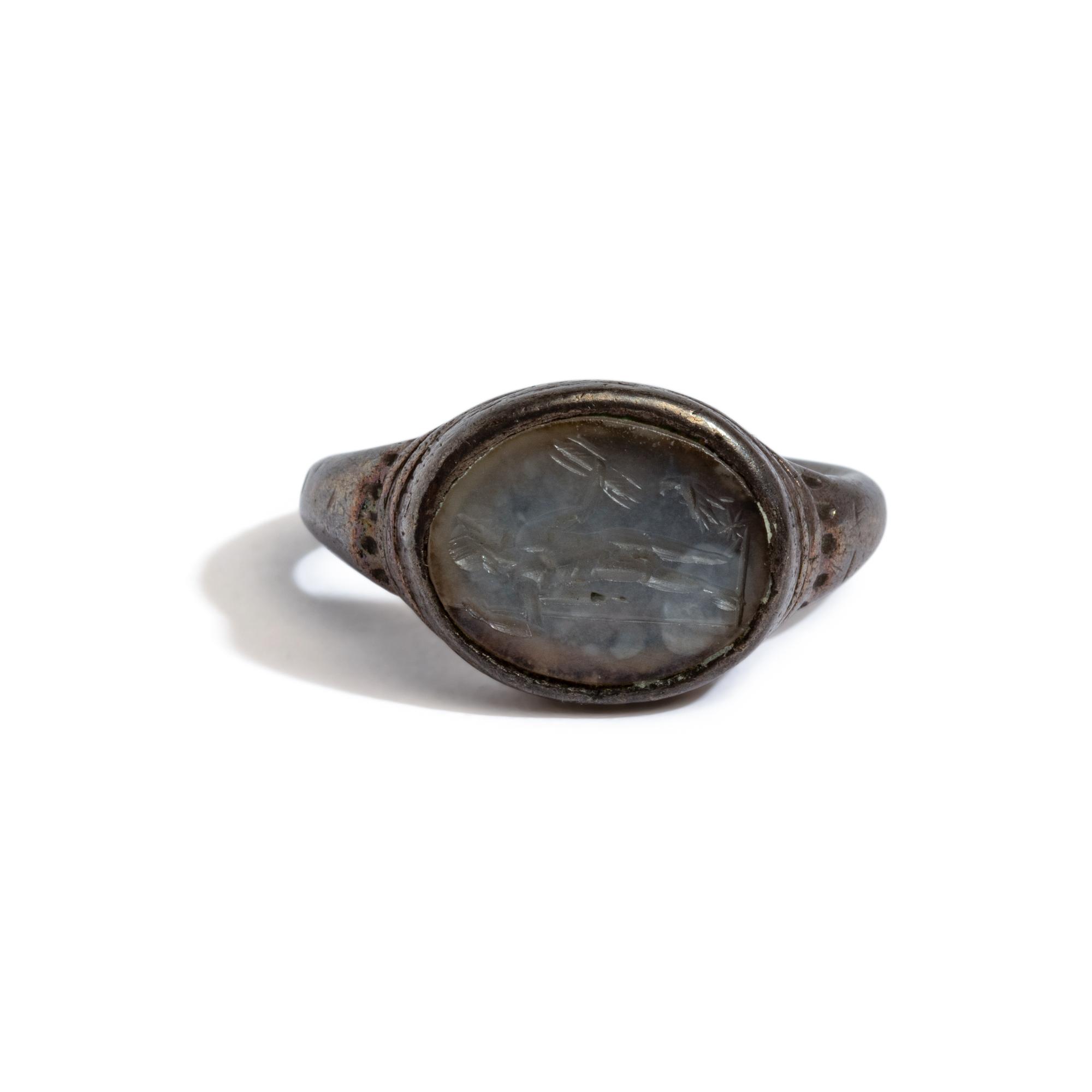 A Roman Silver and Chalcedony Finger Ring with the God Jupiter