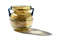 A Roman Yellow Glass Jar with Blue Spiral Trail