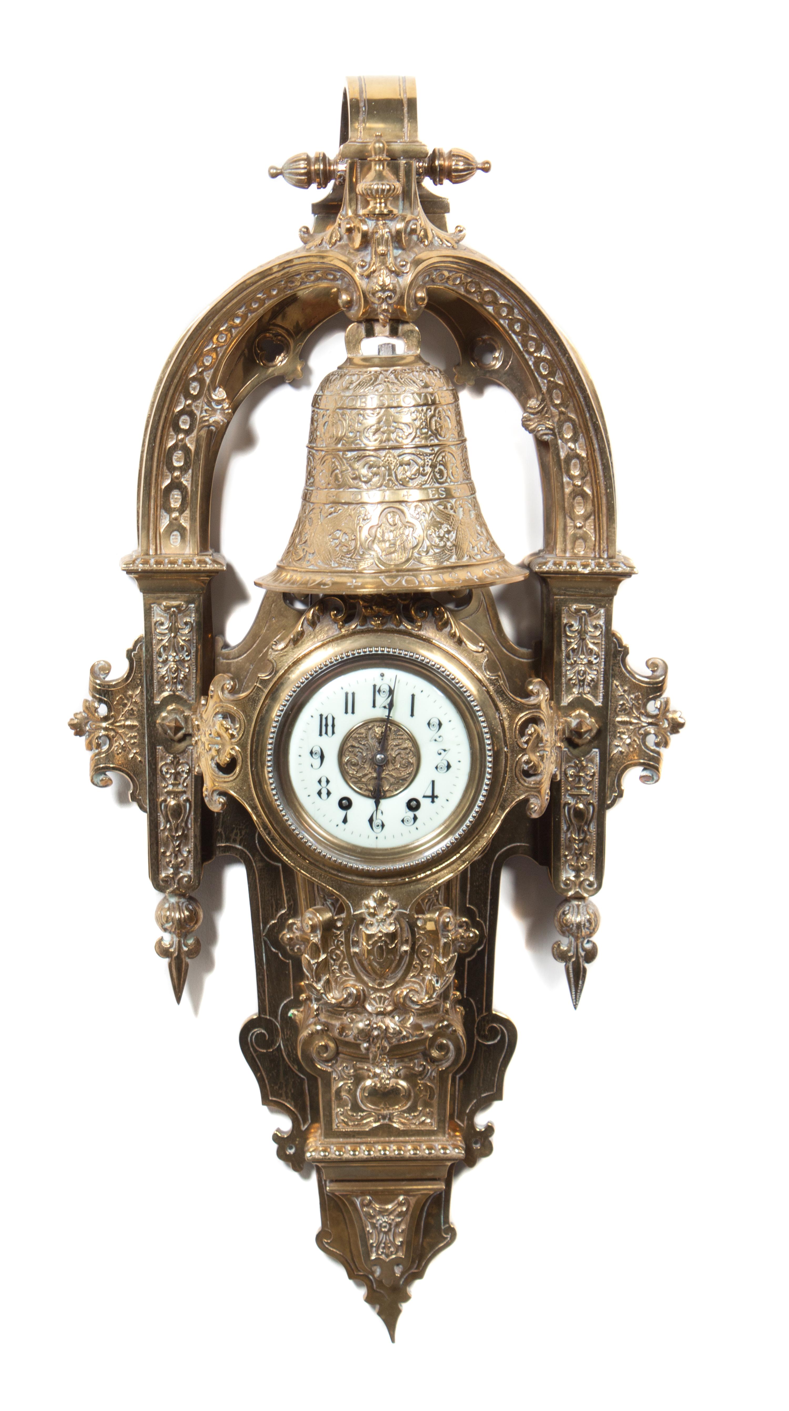 A Victorian Gilt Metal Wall Clock Height 36 inches. — 19TH CENTURY