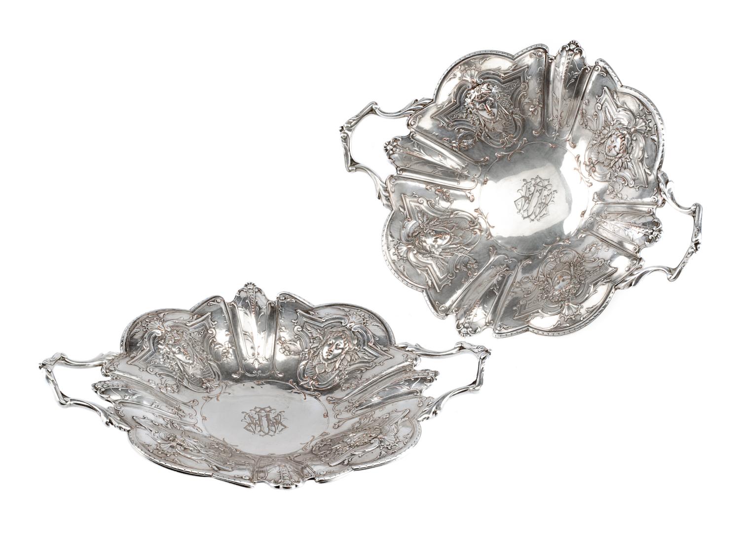 A Pair of French Silver-Plate Serving Bowls, Christofle, Paris, Late 19th Century, each of handled form with mask decoration.