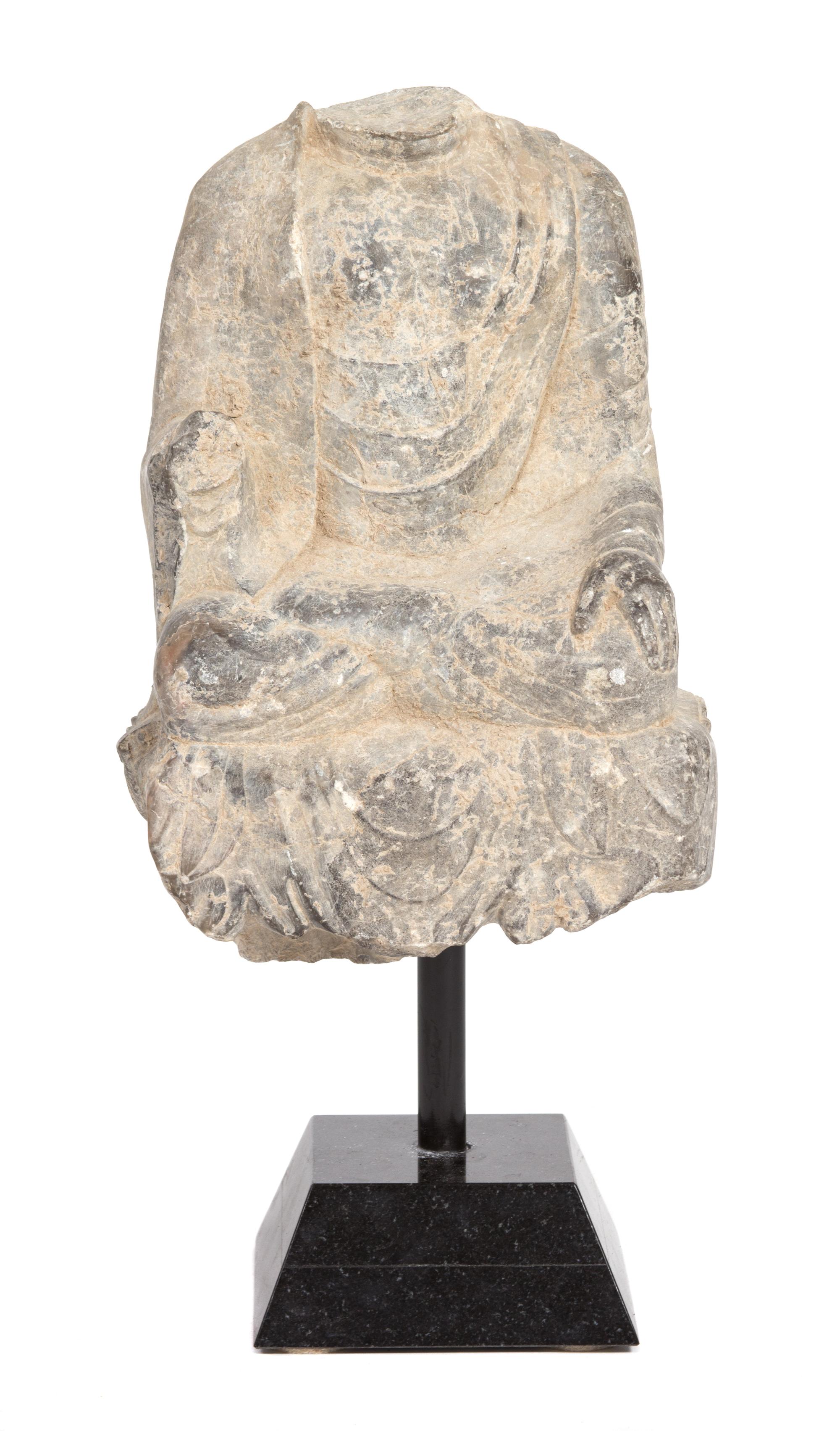 A Chinese Carved Stone Fragment of Seated Figure Height 12 x width 8 3/4 inches. — 19TH CENTURY