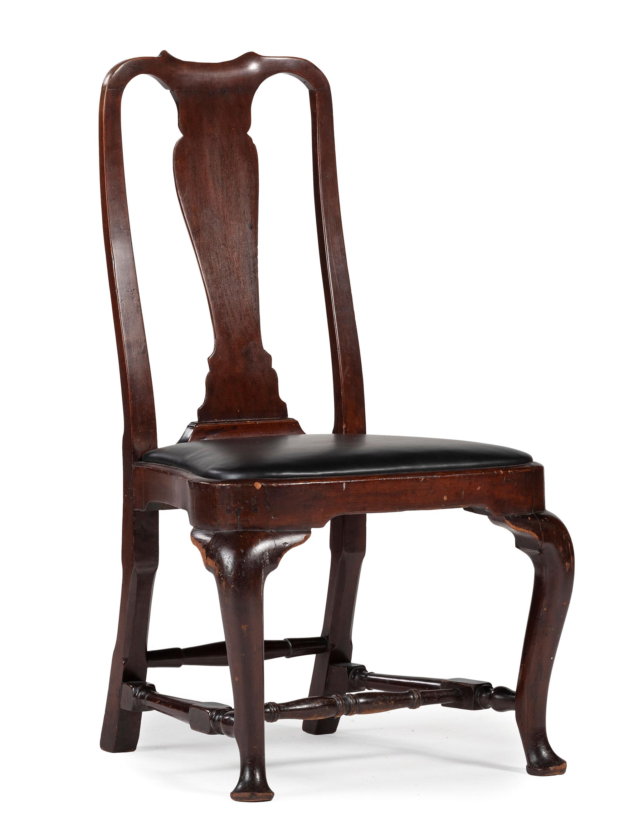 A Queen Anne Carved Walnut Compass-Seat Stretcher-Base Side Chair